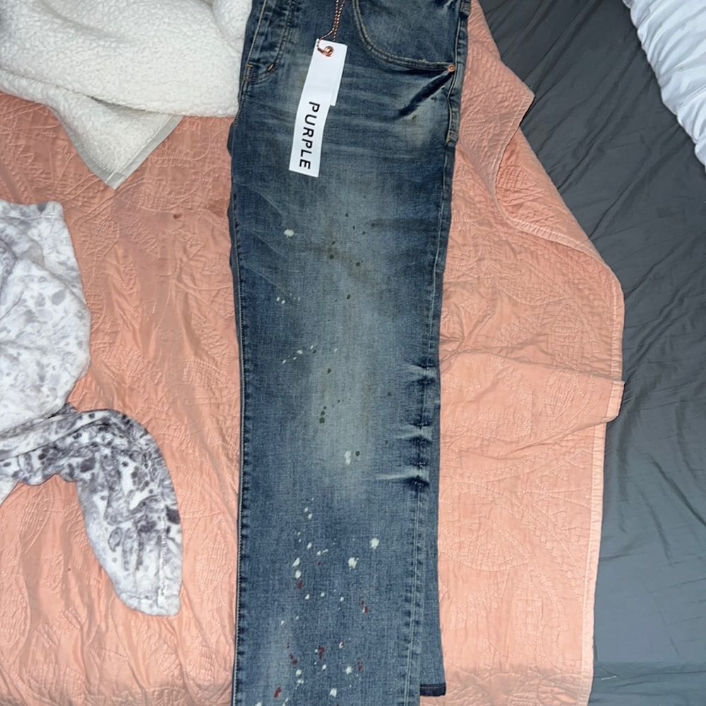 I am selling these purple jeans size 38